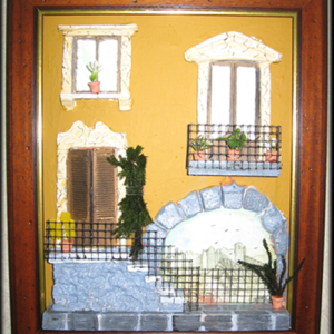 quadro in rilievo, facciata con scalinata e arco