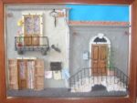 Quadro in rilievo. Facciata rustica.